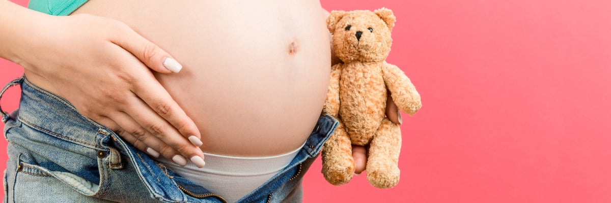 Comment porter un élargisseur de pantalon pendant la grossesse ?